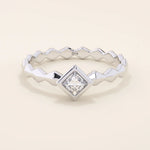 Bezel set princess square cut solitaire engagement ring in 14k solid gold. Sleek modern design for women.