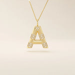 Bold initial necklace in 14k solid gold, fully pavé-set with shimmering moissanites. A statement-making personalized jewelry piece.
