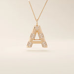 Bold initial necklace in 14k solid gold, fully pavé-set with shimmering moissanites. A statement-making personalized jewelry piece.