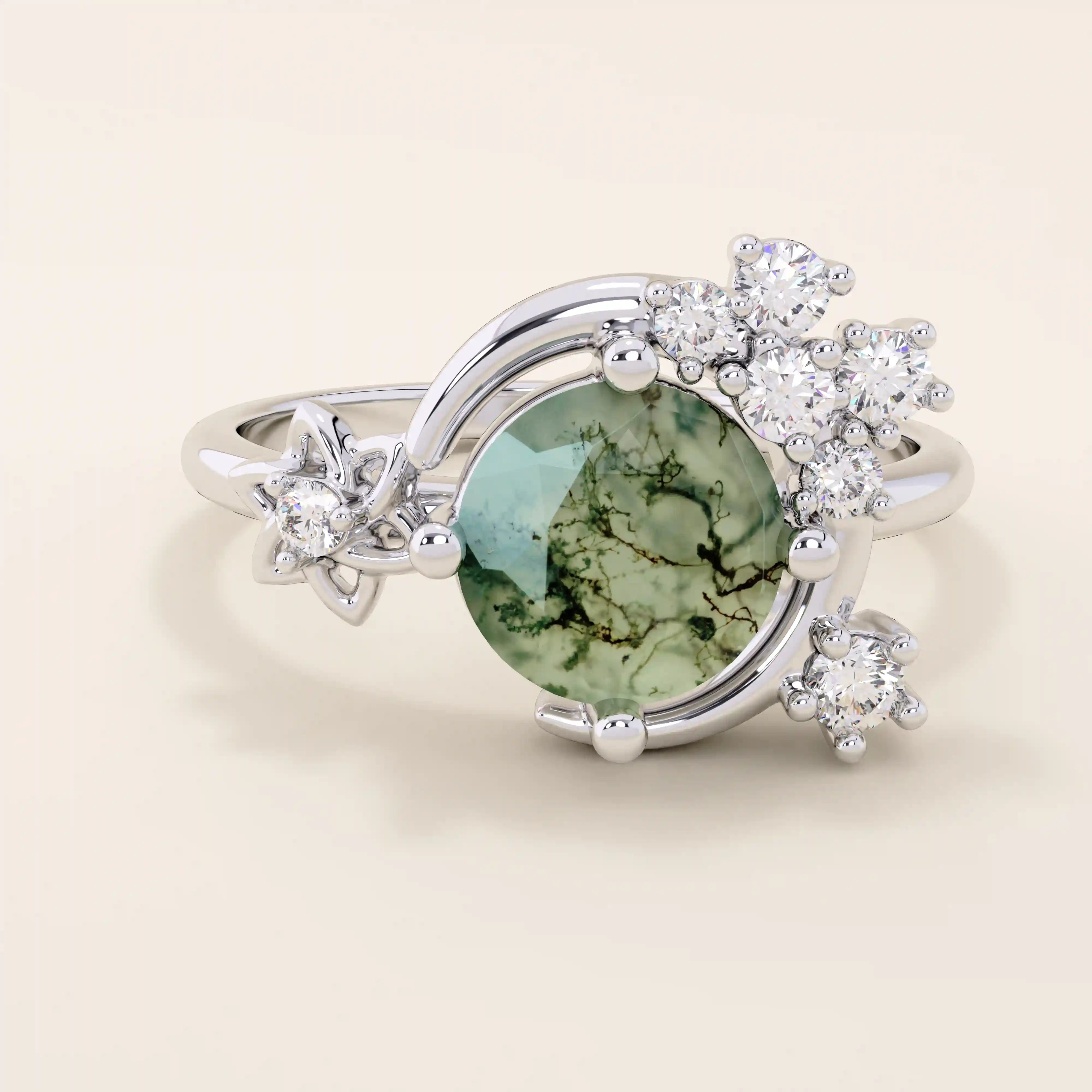 Chunky 14k gold ring with moss agate stone and celestial moon detail. Unique gemstone ring with natural patterns. Ideal for earthy and bold styles.
