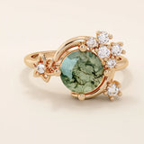 Chunky 14k gold ring with moss agate stone and celestial moon detail. Unique gemstone ring with natural patterns. Ideal for earthy and bold styles.