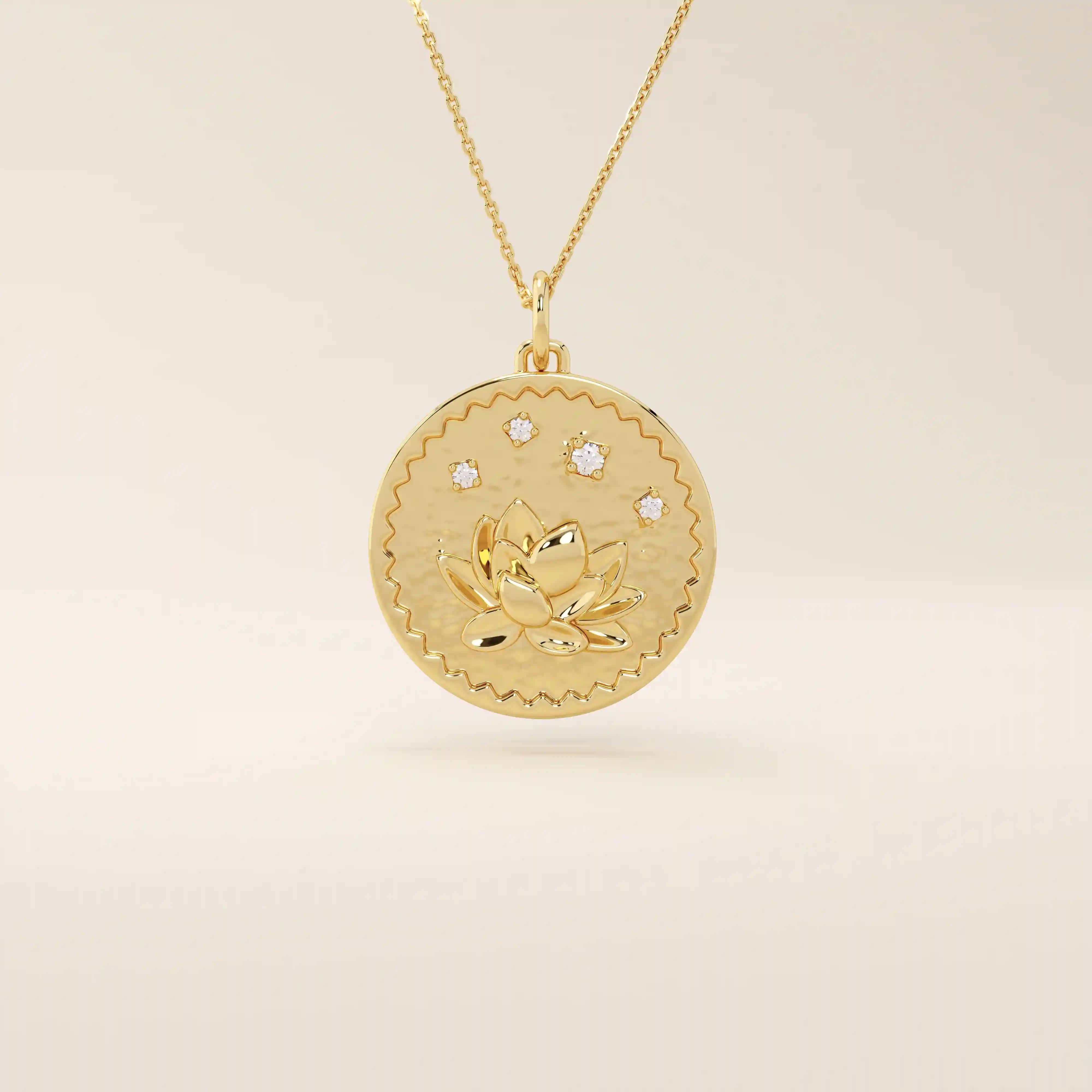 Close-up of a 14k solid gold pendant necklace featuring an embossed water lily and a tiny moissanite. Dainty nature-inspired jewelry for women. Ideal as a minimalist everyday gold necklace.