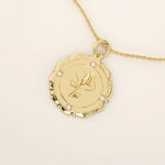 Close-up of a 14k solid gold pendant necklace with an embossed single rose and tiny moissanites. Romantic floral gold necklace for women. Perfect minimalist jewelry gift.