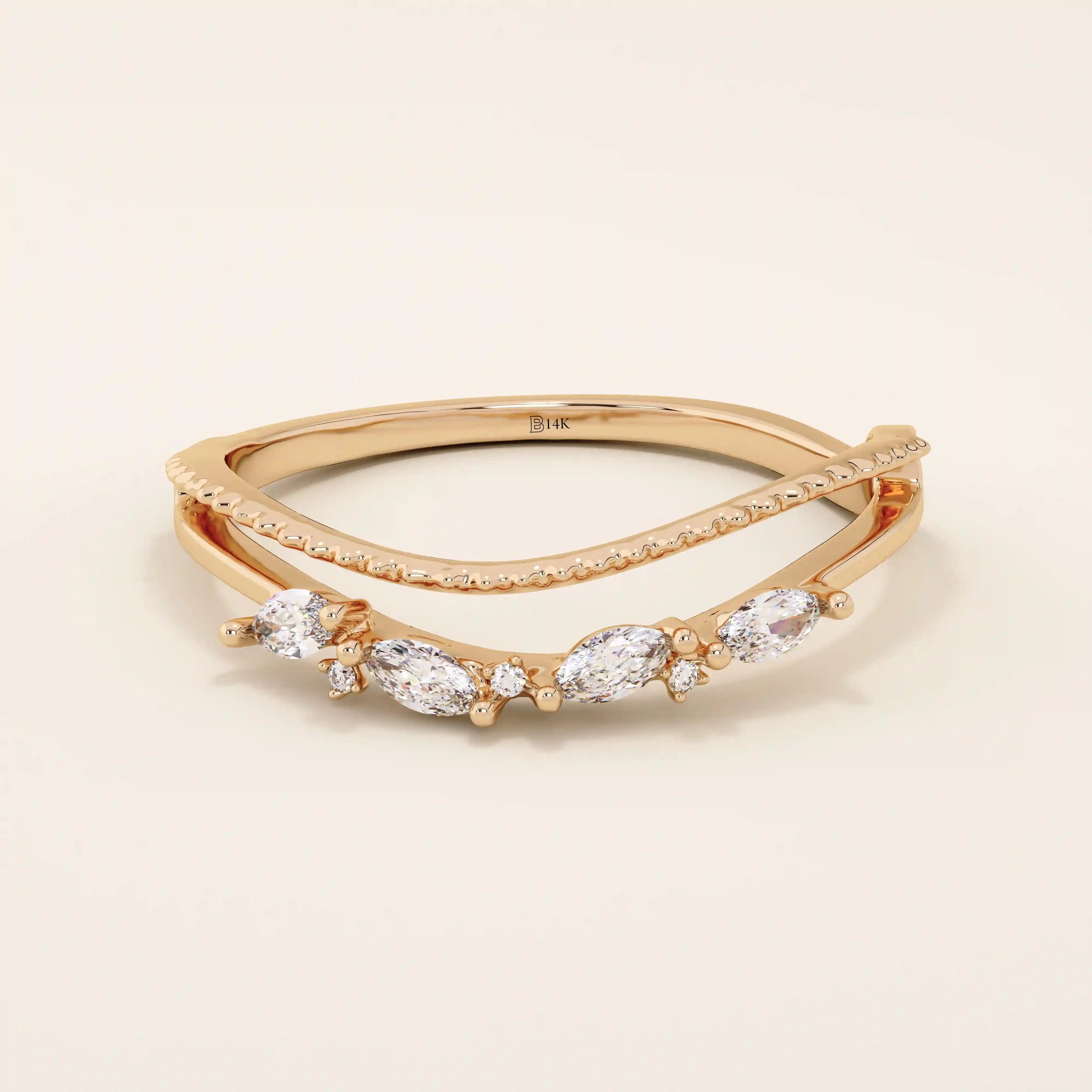 Curved beaded ring in 14k solid gold, featuring marquise and round moissanites. A unique nesting design perfect for stacking with solitaires.