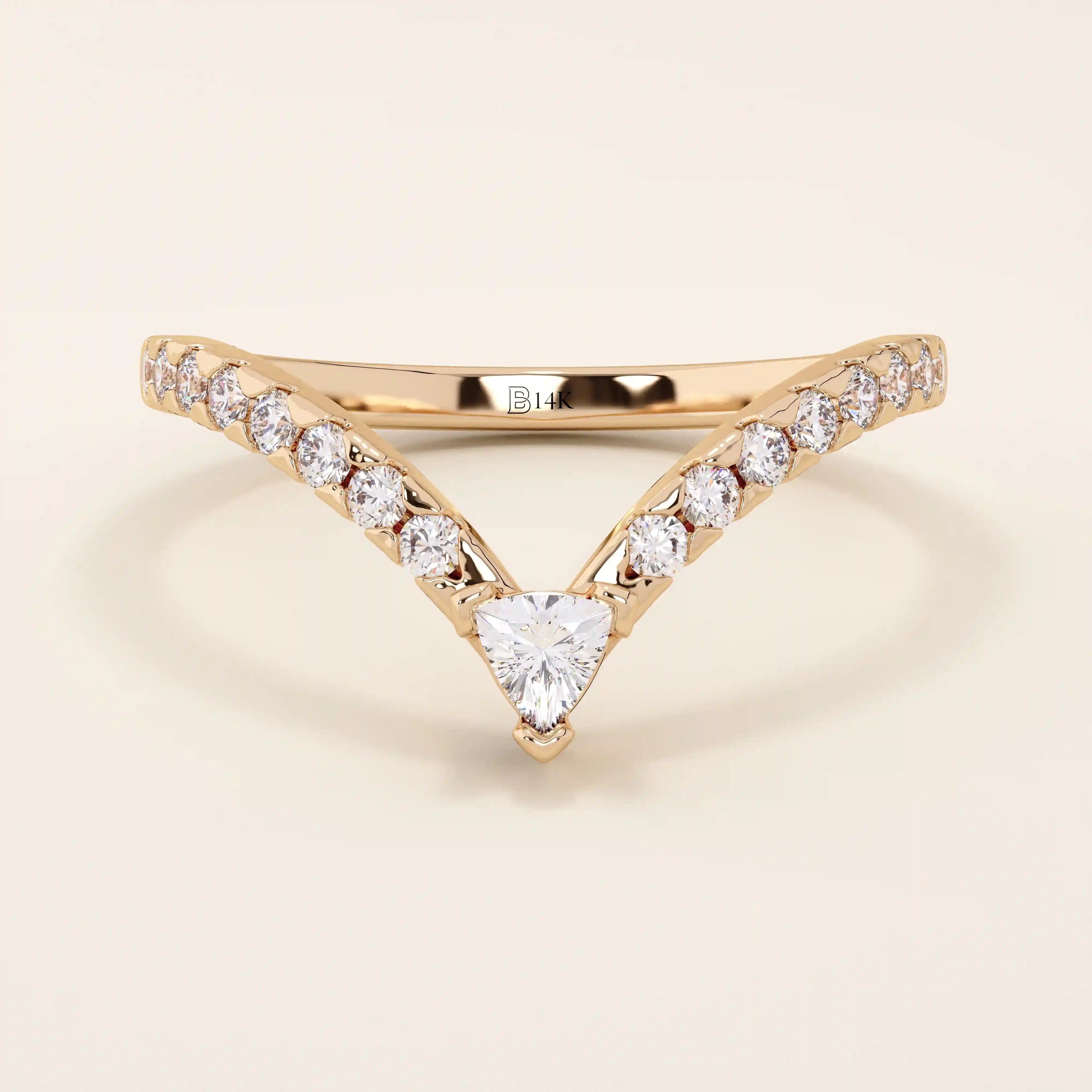 Curved stacking ring in 14k solid gold with a triangle moissanite at the peak and pavé moissanite accents. A modern, geometric nesting design.