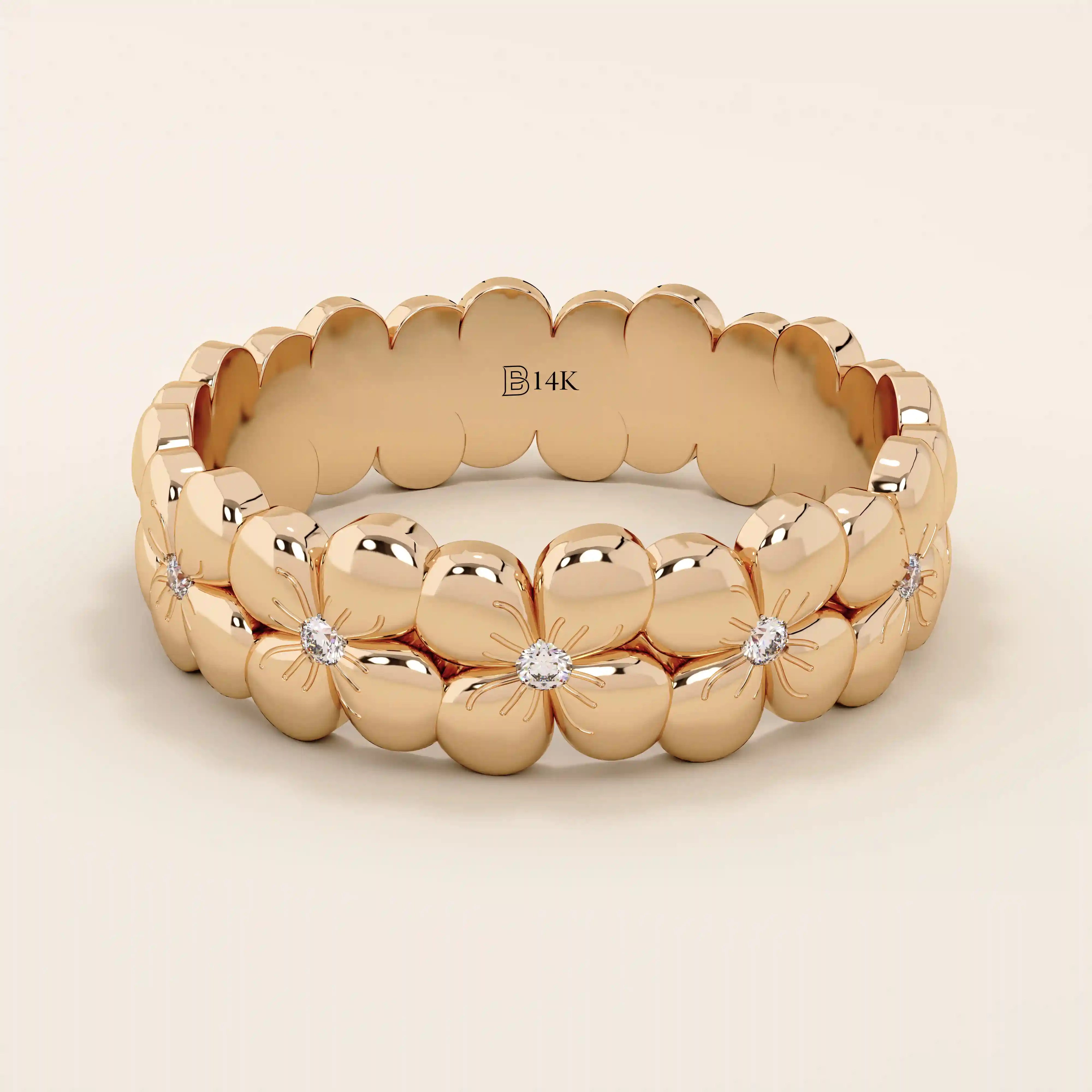 Daisy flower band ring in 14k solid gold, featuring tiny pavé moissanites. A thick yet delicate statement ring with floral charm.