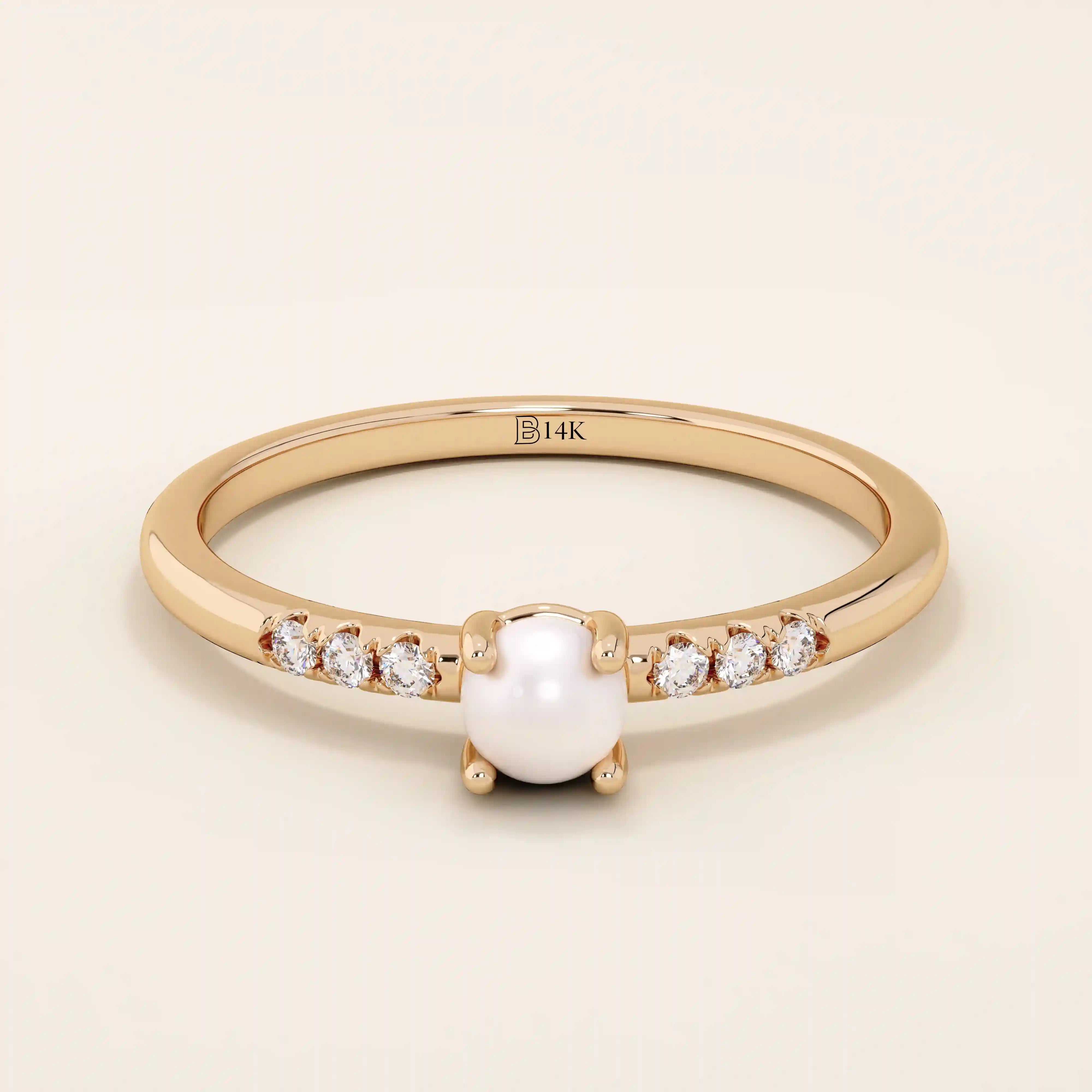 Delicate 14k solid gold promise ring featuring a small lustrous pearl. Minimalist and elegant design perfect for everyday wear.