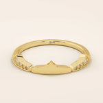 Distinctive 14k solid gold stacking ring with a unique design. A versatile piece perfect for mixing and matching in any ring stack.