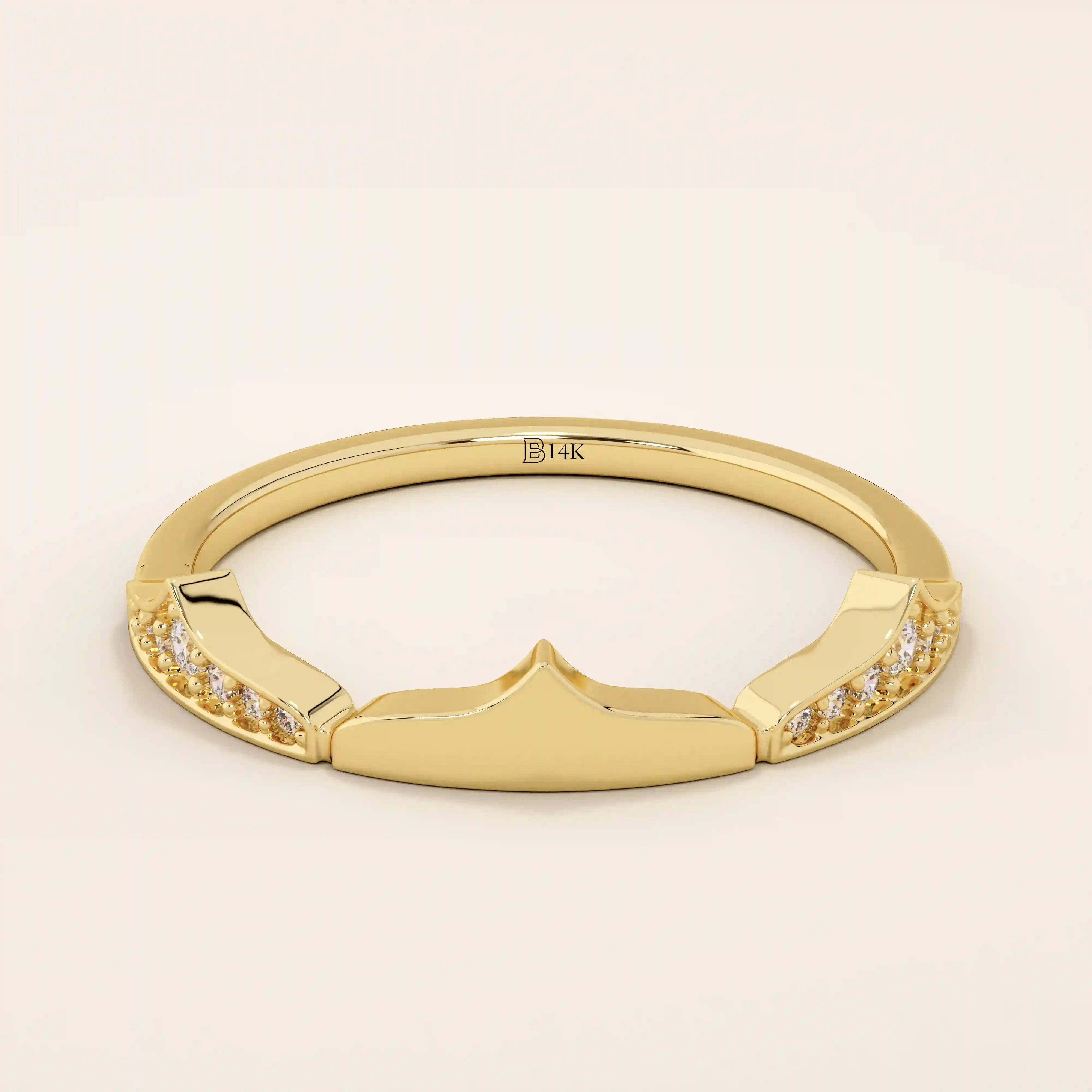 Distinctive 14k solid gold stacking ring with a unique design. A versatile piece perfect for mixing and matching in any ring stack.