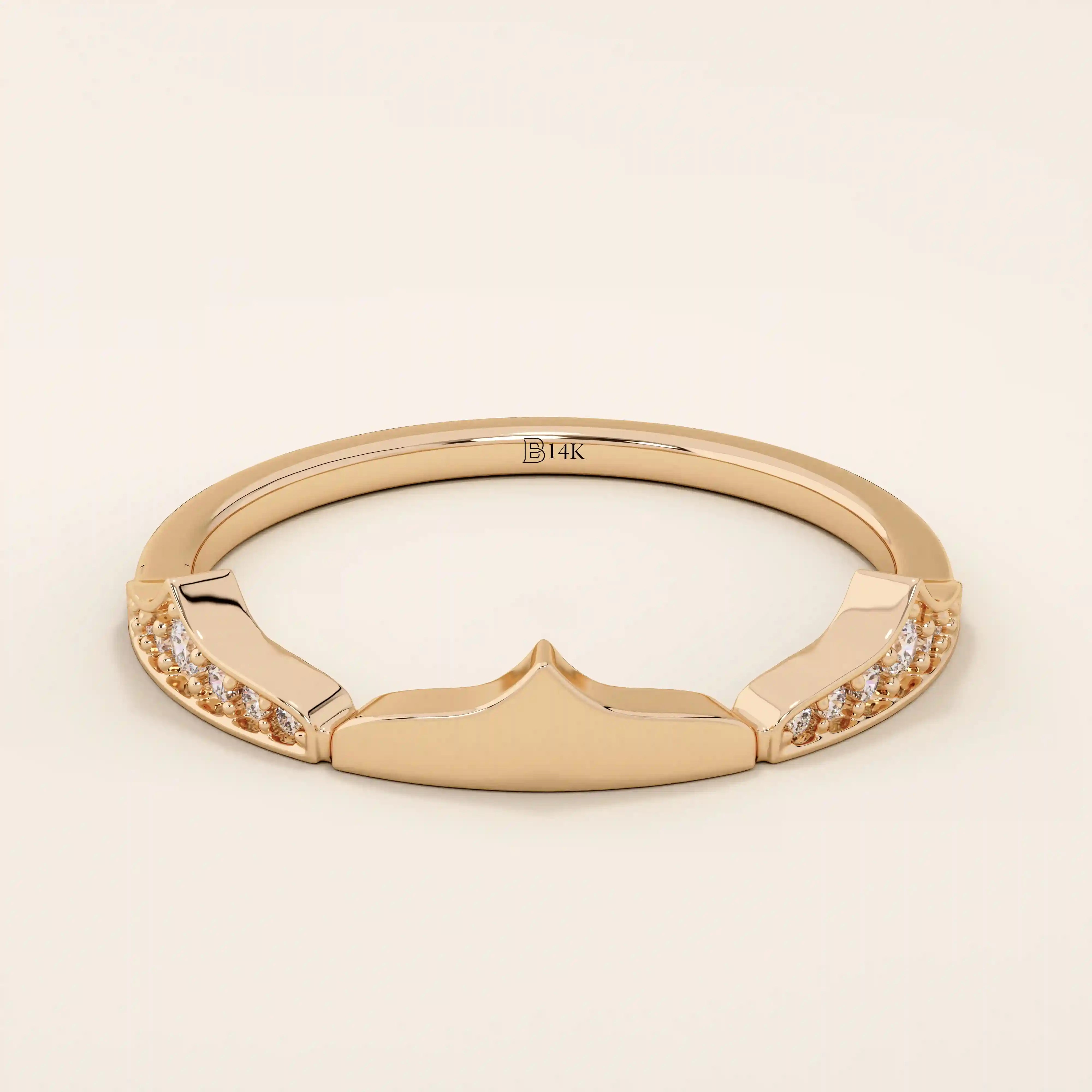 Distinctive 14k solid gold stacking ring with a unique design. A versatile piece perfect for mixing and matching in any ring stack.