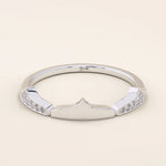 Distinctive 14k solid gold stacking ring with a unique design. A versatile piece perfect for mixing and matching in any ring stack.