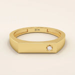 Minimalist 14k solid gold bar-shaped pinky signet ring featuring a single moissanite stone. Sleek and modern design perfect for everyday wear.