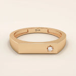 Minimalist 14k solid gold bar-shaped pinky signet ring featuring a single moissanite stone. Sleek and modern design perfect for everyday wear.