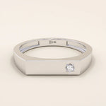 Minimalist 14k solid gold bar-shaped pinky signet ring featuring a single moissanite stone. Sleek and modern design perfect for everyday wear.