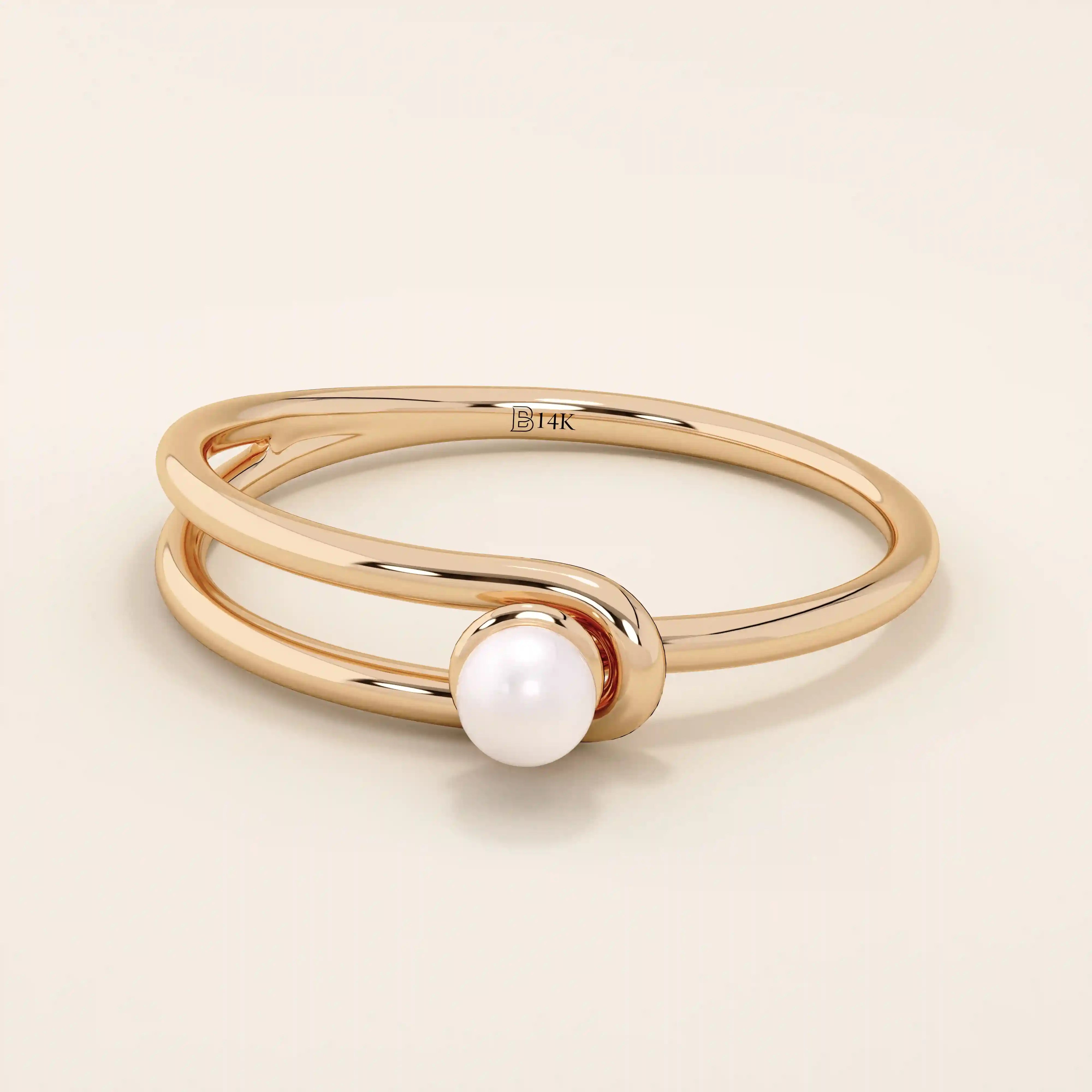 Minimalist 14k solid gold split band promise ring featuring a single lustrous pearl. Elegant design perfect for everyday wear or special occasions.