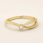 Minimalist 14k solid gold split band promise ring featuring a single small moissanite stone, designed for modern elegance and everyday wear.