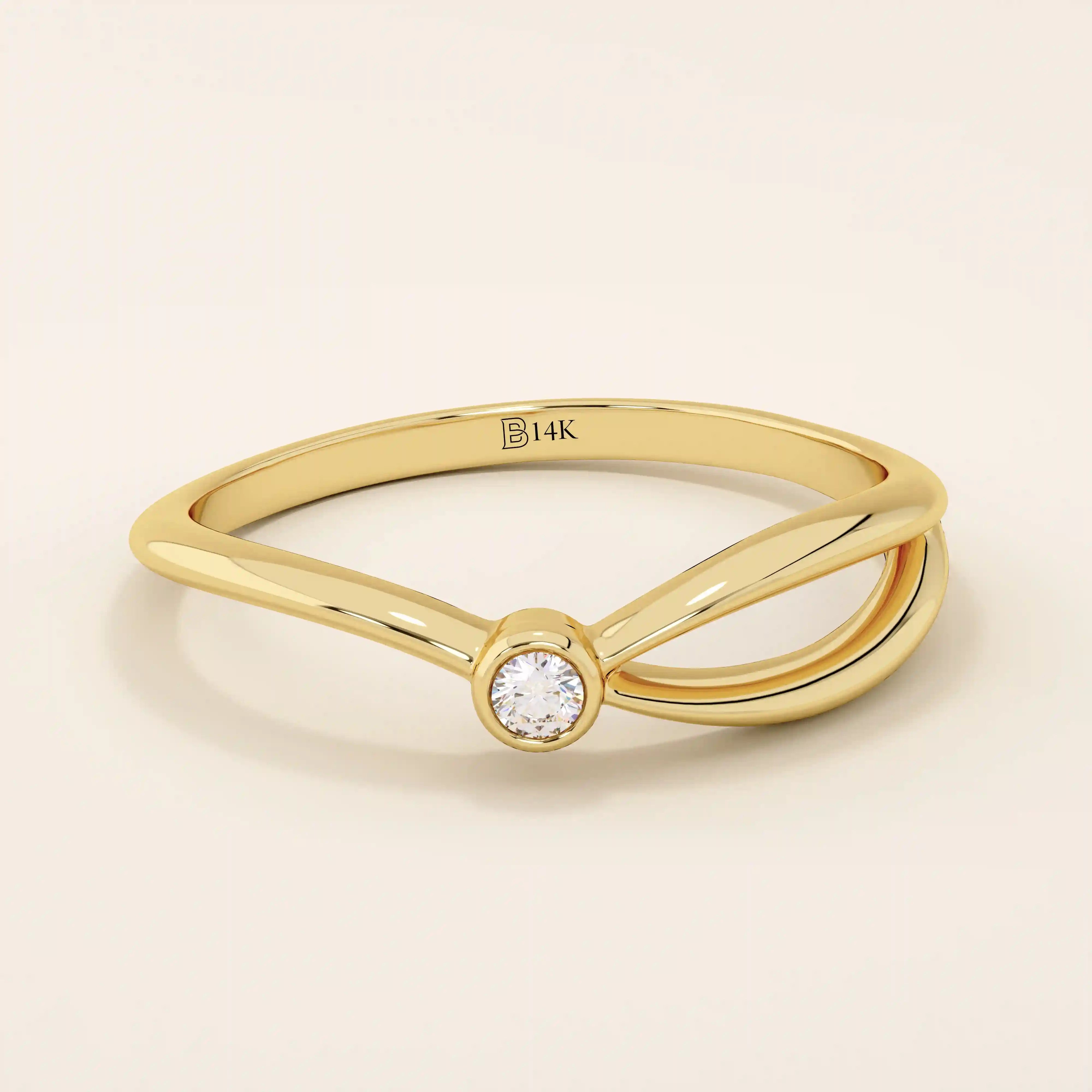 Minimalist 14k solid gold split band promise ring featuring a single small moissanite stone, designed for modern elegance and everyday wear.