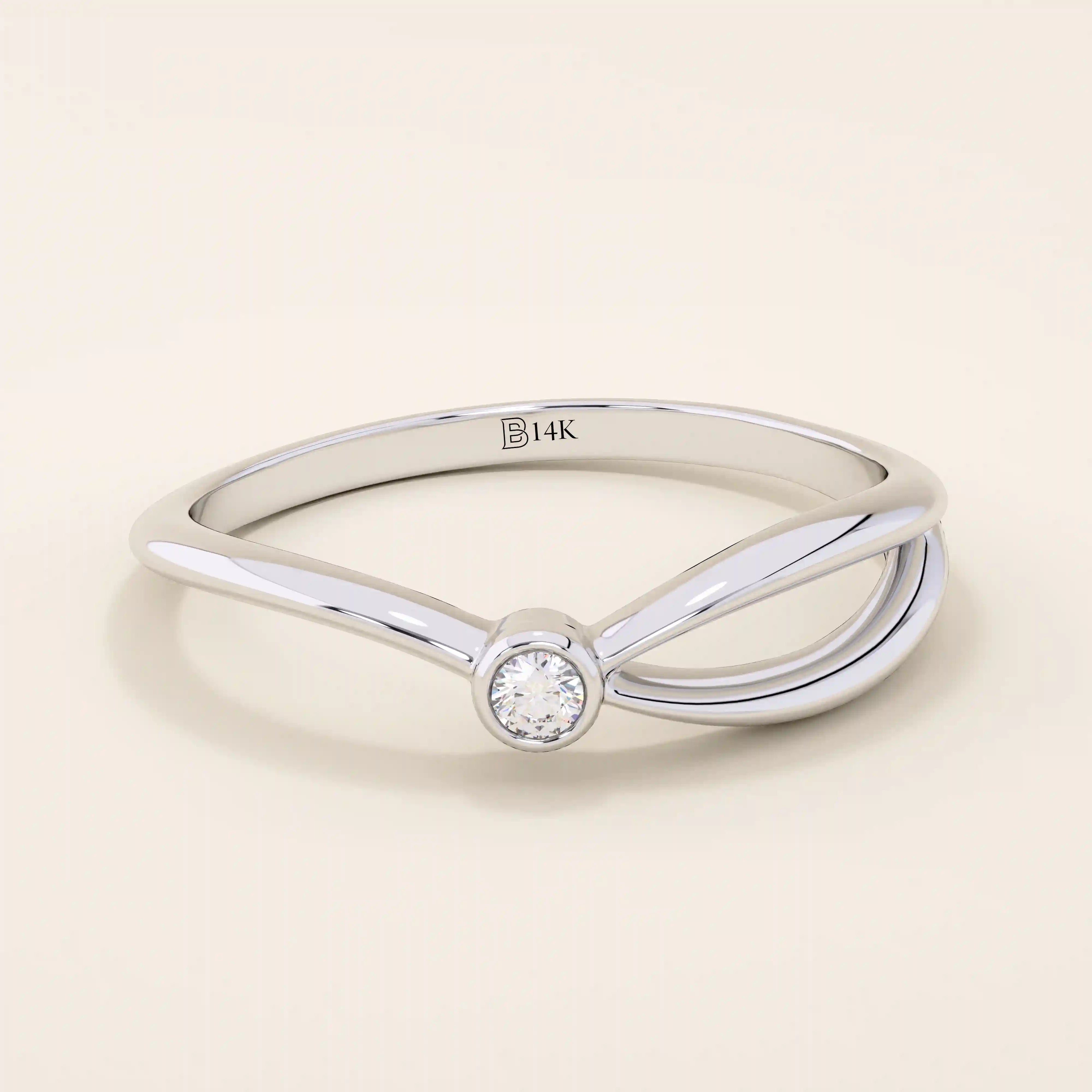 Minimalist 14k solid gold split band promise ring featuring a single small moissanite stone, designed for modern elegance and everyday wear.
