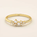Minimalist cluster moissanite stacking wedding ring crafted in 14k solid gold, featuring a delicate round stone arrangement for timeless elegance.
