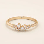 Minimalist cluster moissanite stacking wedding ring crafted in 14k solid gold, featuring a delicate round stone arrangement for timeless elegance.