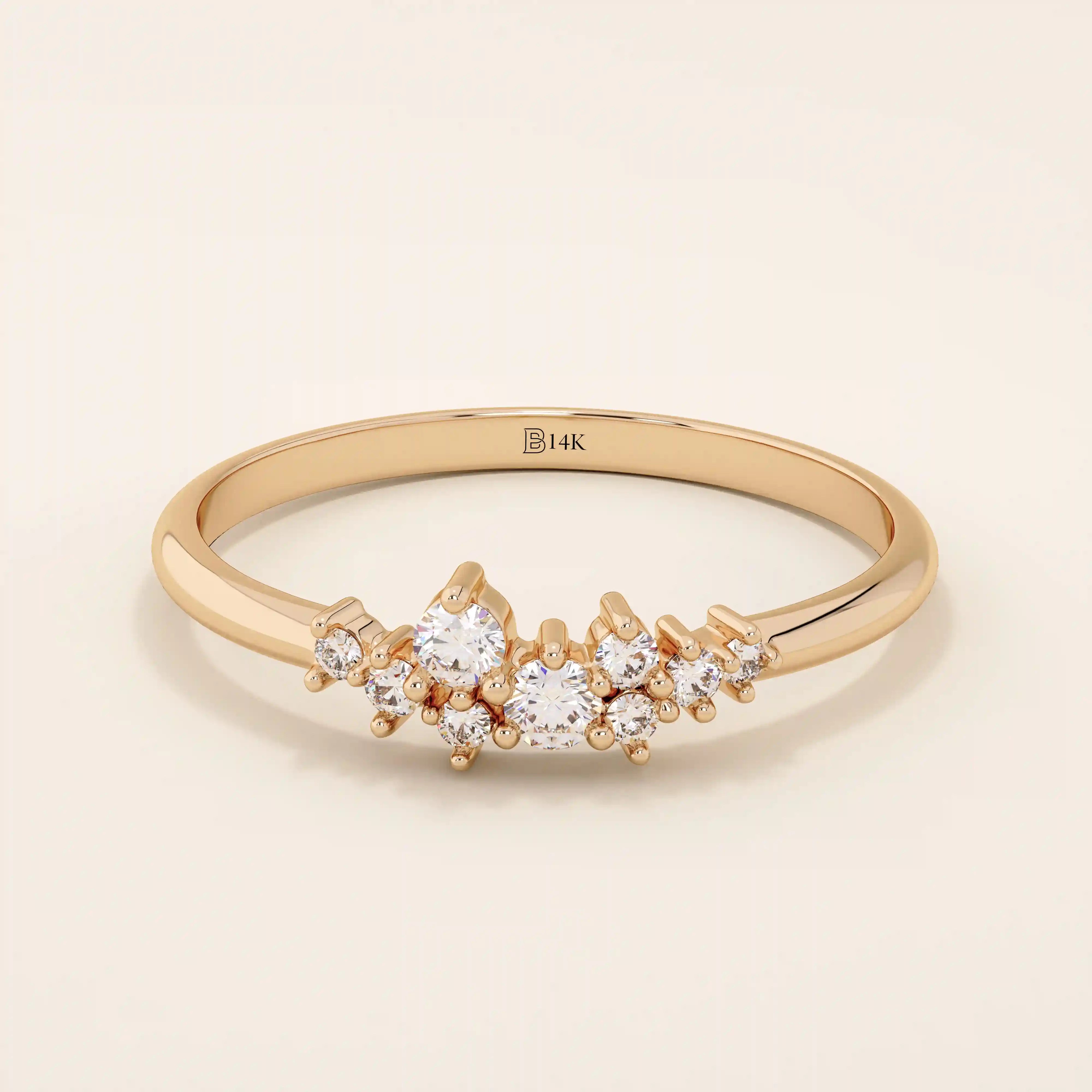 Minimalist cluster moissanite stacking wedding ring crafted in 14k solid gold, featuring a delicate round stone arrangement for timeless elegance.