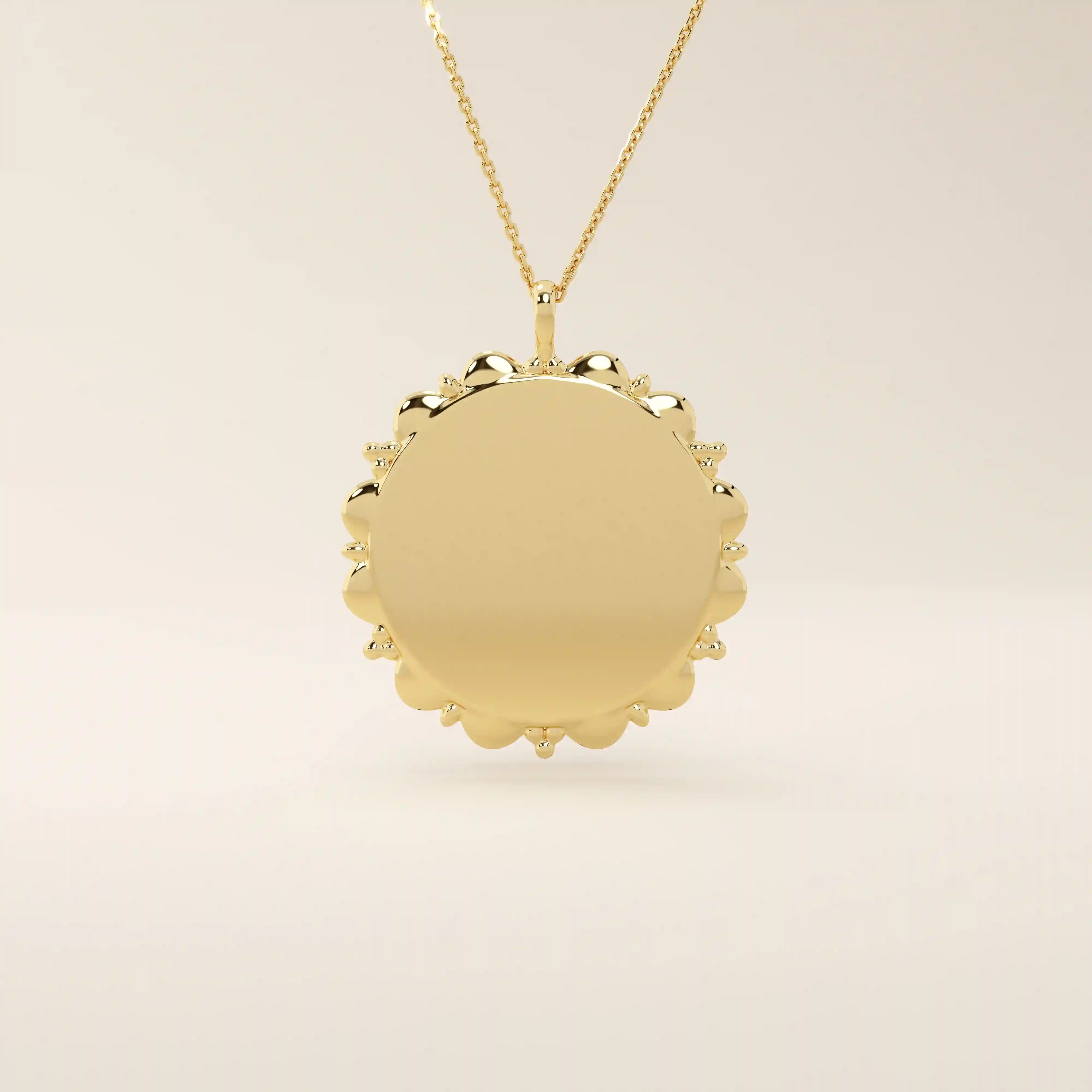 Minimalist sun-shaped necklace in 14k solid gold with a smooth, engravable surface. A timeless everyday piece perfect for personalization and gifting.