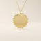Minimalist sun-shaped necklace in 14k solid gold with a smooth, engravable surface. A timeless everyday piece perfect for personalization and gifting.