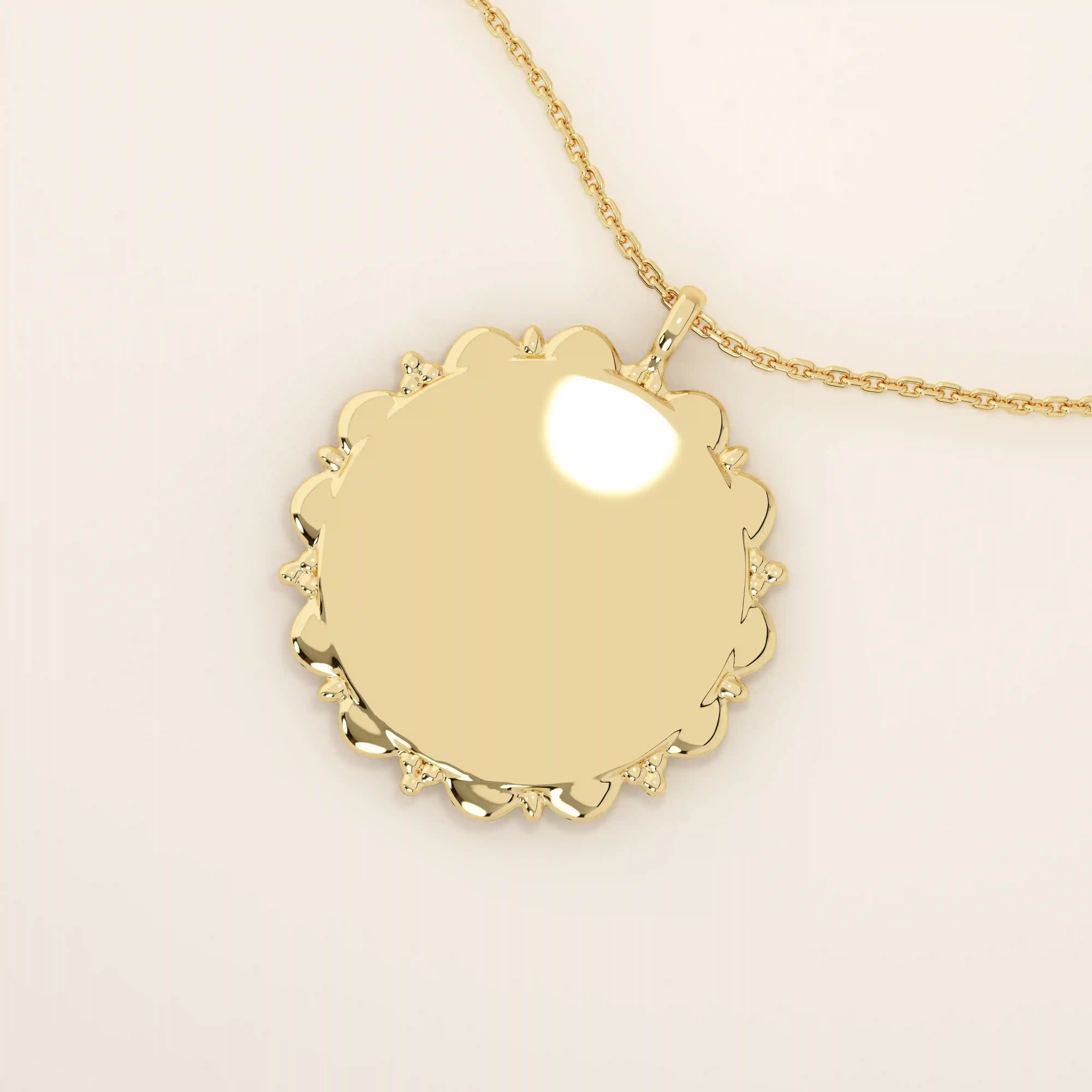 Minimalist sun-shaped necklace in 14k solid gold with a smooth, engravable surface. A timeless everyday piece perfect for personalization and gifting.
