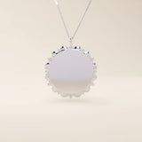 Minimalist sun-shaped necklace in 14k solid gold with a smooth, engravable surface. A timeless everyday piece perfect for personalization and gifting.