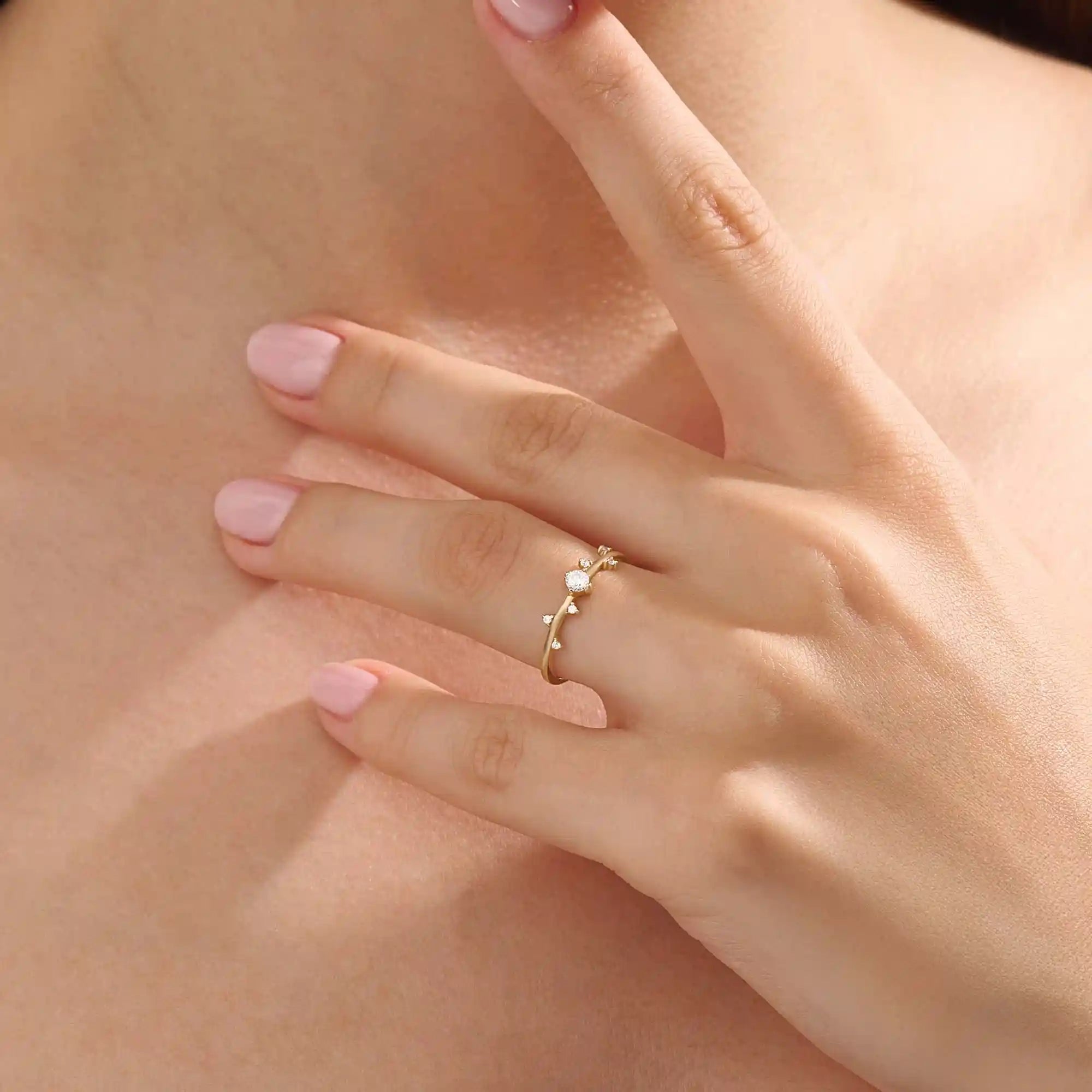 Model wearing a 14k solid gold minimalist solo promise ring, highlighting its simple yet elegant design for a modern, everyday look.