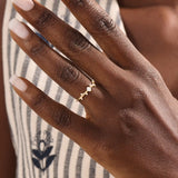 Model wearing a 14k solid gold minimalist solo promise ring, highlighting its simple yet elegant design for a modern, everyday look.