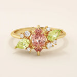 14K ENGAGEMENT RING  with a marquise Padparadscha Sapphire, complemented by pear-cut olive green sapphire and sparkling moissanite stones FOR WOMEN