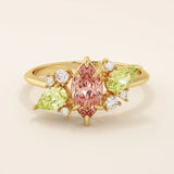 14K ENGAGEMENT RING  with a marquise Padparadscha Sapphire, complemented by pear-cut olive green sapphire and sparkling moissanite stones FOR WOMEN