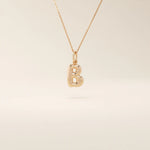 Puffy initial letter necklace crafted in 14k solid gold with a soft, dimensional finish. A modern personalized piece ideal for everyday layering.
