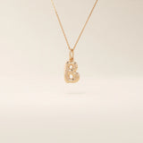 Puffy initial letter necklace crafted in 14k solid gold with a soft, dimensional finish. A modern personalized piece ideal for everyday layering.