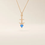 Sagittarius zodiac symbol pendant necklace in 14k solid gold with turquoise gemstone.