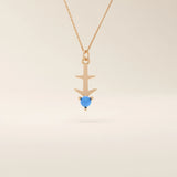 Sagittarius zodiac symbol pendant necklace in 14k solid gold with turquoise gemstone.