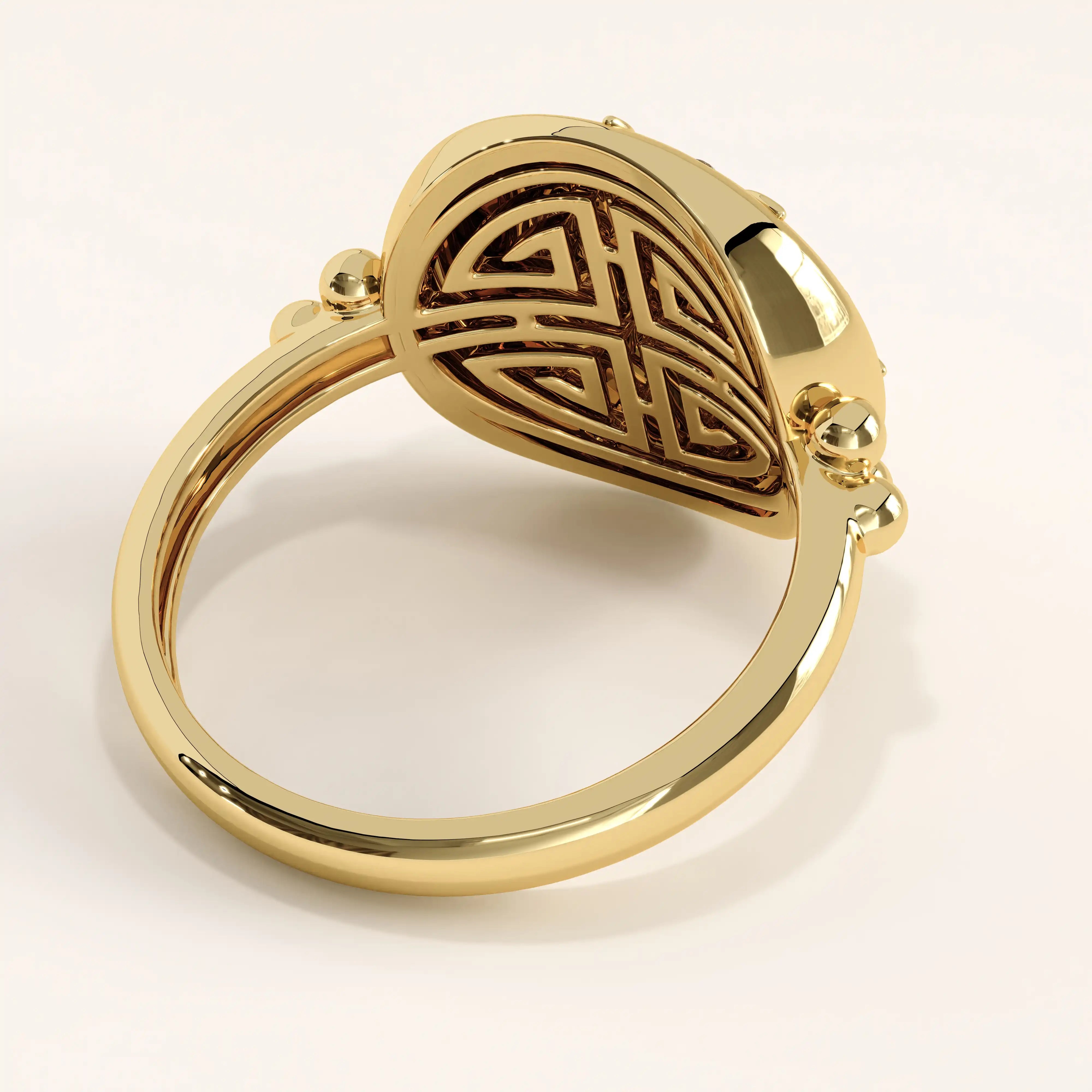 Side view of 14k gold vermeil boho sun ring showcasing its raised sun motif and beaded band details with polished reflective finish.
