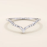 Slim chevron-shaped curve ring in 14k solid gold, accented with pavé moissanites. A delicate nesting band with modern lines and sparkle.