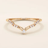Slim chevron-shaped curve ring in 14k solid gold, accented with pavé moissanites. A delicate nesting band with modern lines and sparkle.