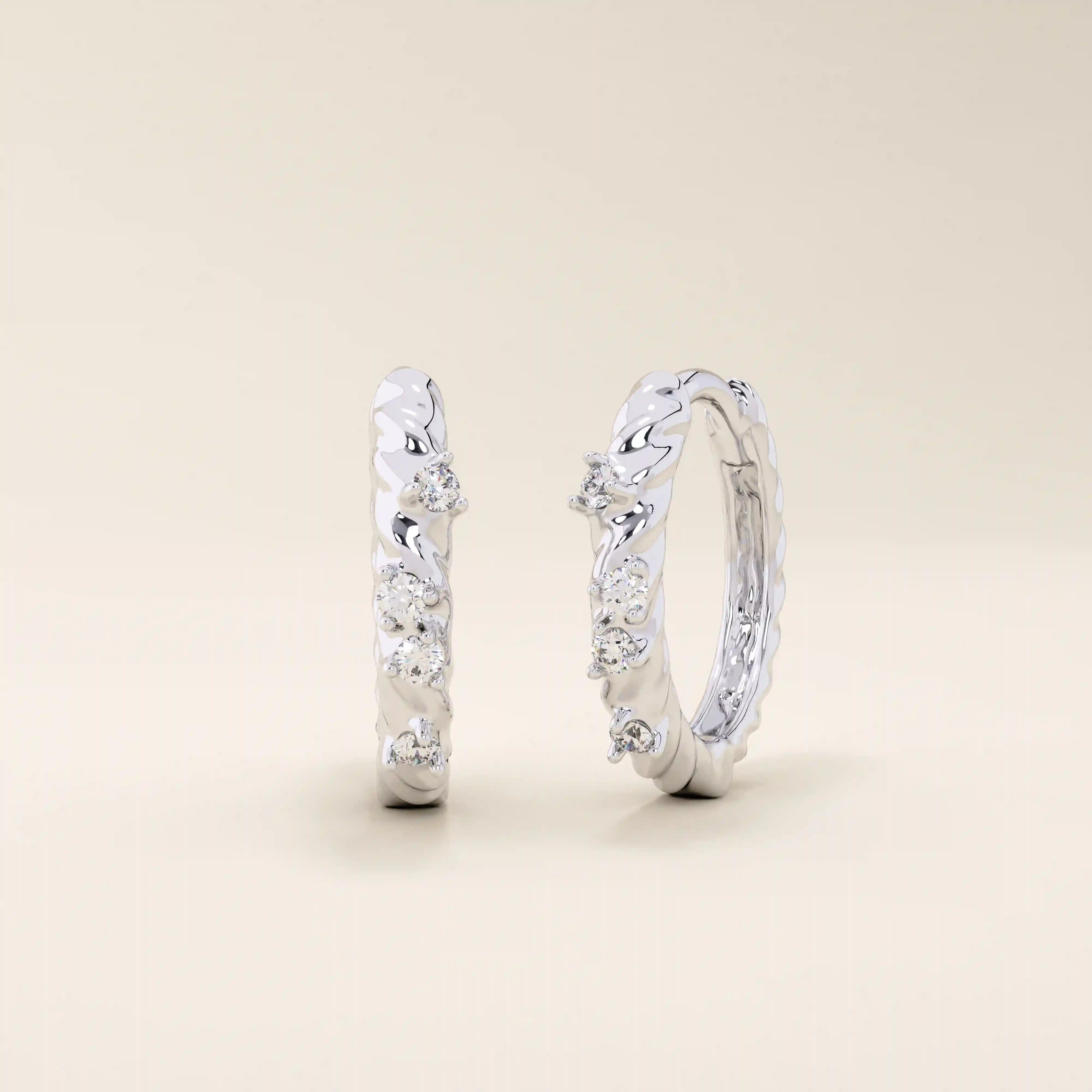 Twist rope hoop earrings in 14k white gold, set with shimmering moissanite for a refined touch.
