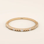 Ultra thin 14k solid gold stacking ring with a delicate beaded band texture. Minimalist and perfect for layering.