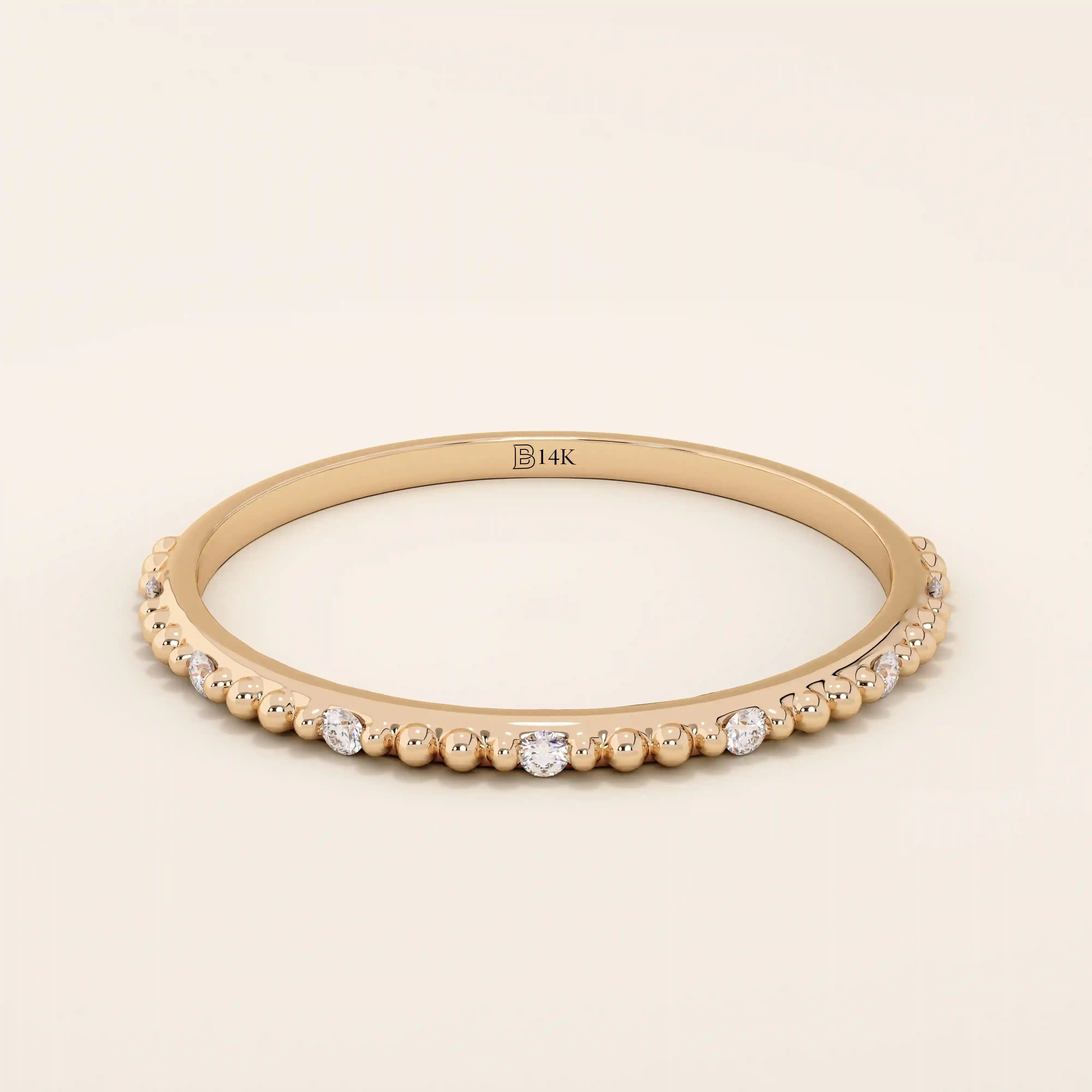 Ultra thin 14k solid gold stacking ring with a delicate beaded band texture. Minimalist and perfect for layering.
