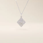 Unique 14k solid gold clover motif necklace featuring a smooth, plain pendant in a four-leaf design, symbolizing luck and elegance, perfect for everyday wear.