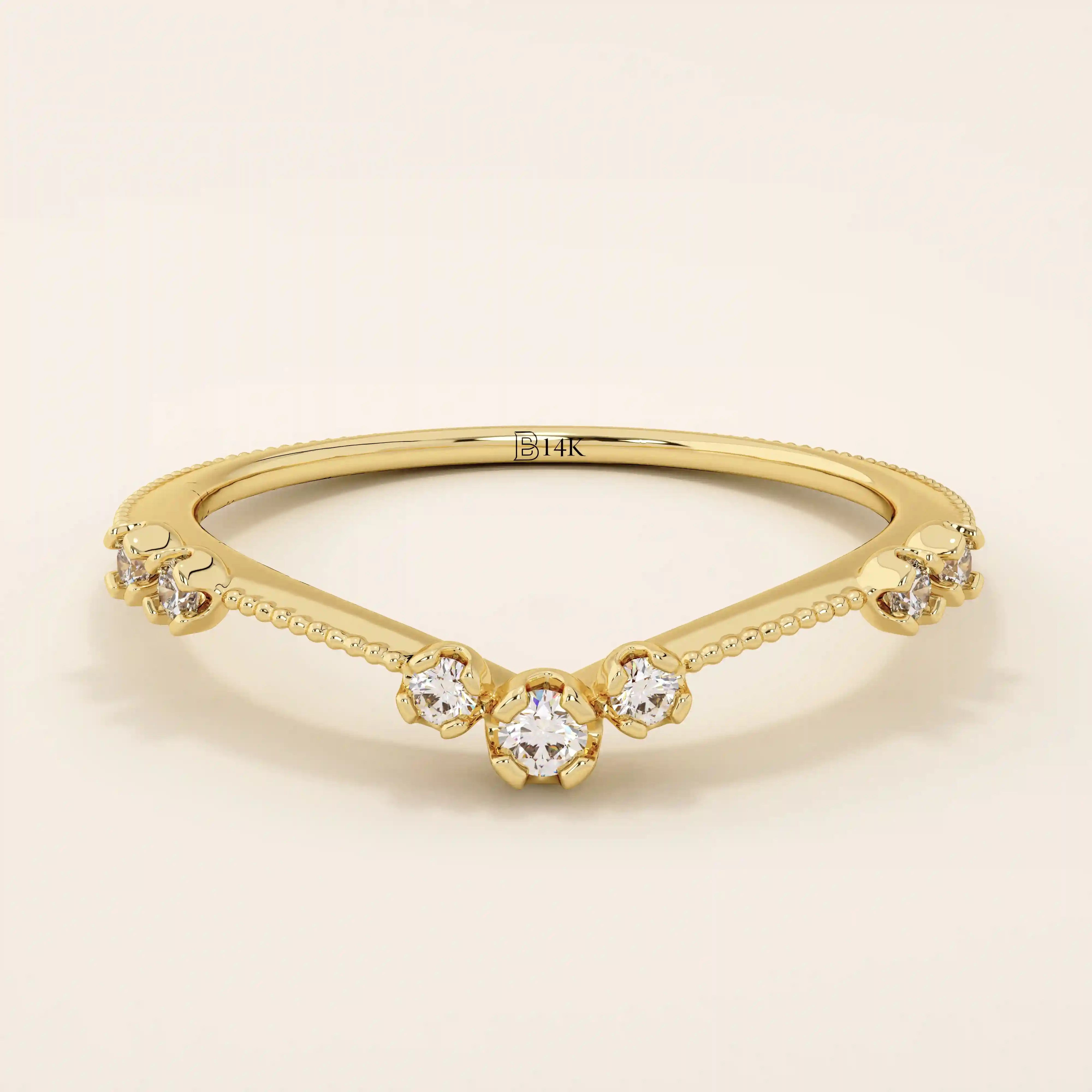 Vintage-inspired slim curved stacking ring in 14k solid gold featuring tiny moissanites set on a milgrain textured band. Elegant and detailed design perfect for layering.