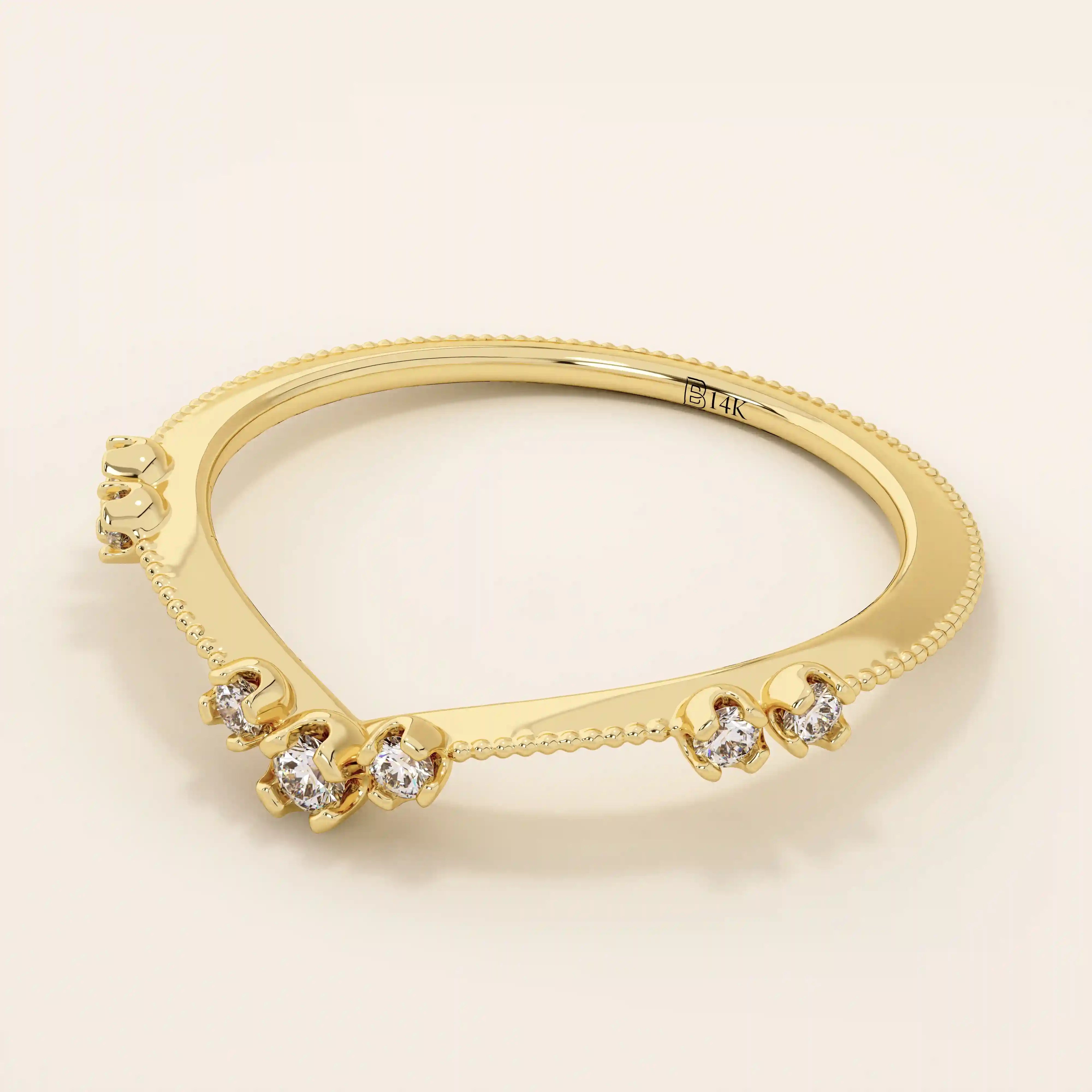 Vintage-inspired slim curved stacking ring in 14k solid gold featuring tiny moissanites set on a milgrain textured band. Elegant and detailed design perfect for layering.