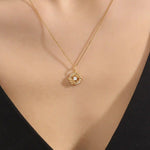 Woman wearing a 14k solid gold circle pendant necklace with sparkling pave moissanites. Unique and stylish gold jewelry piece. Perfect for everyday elegance or layering.