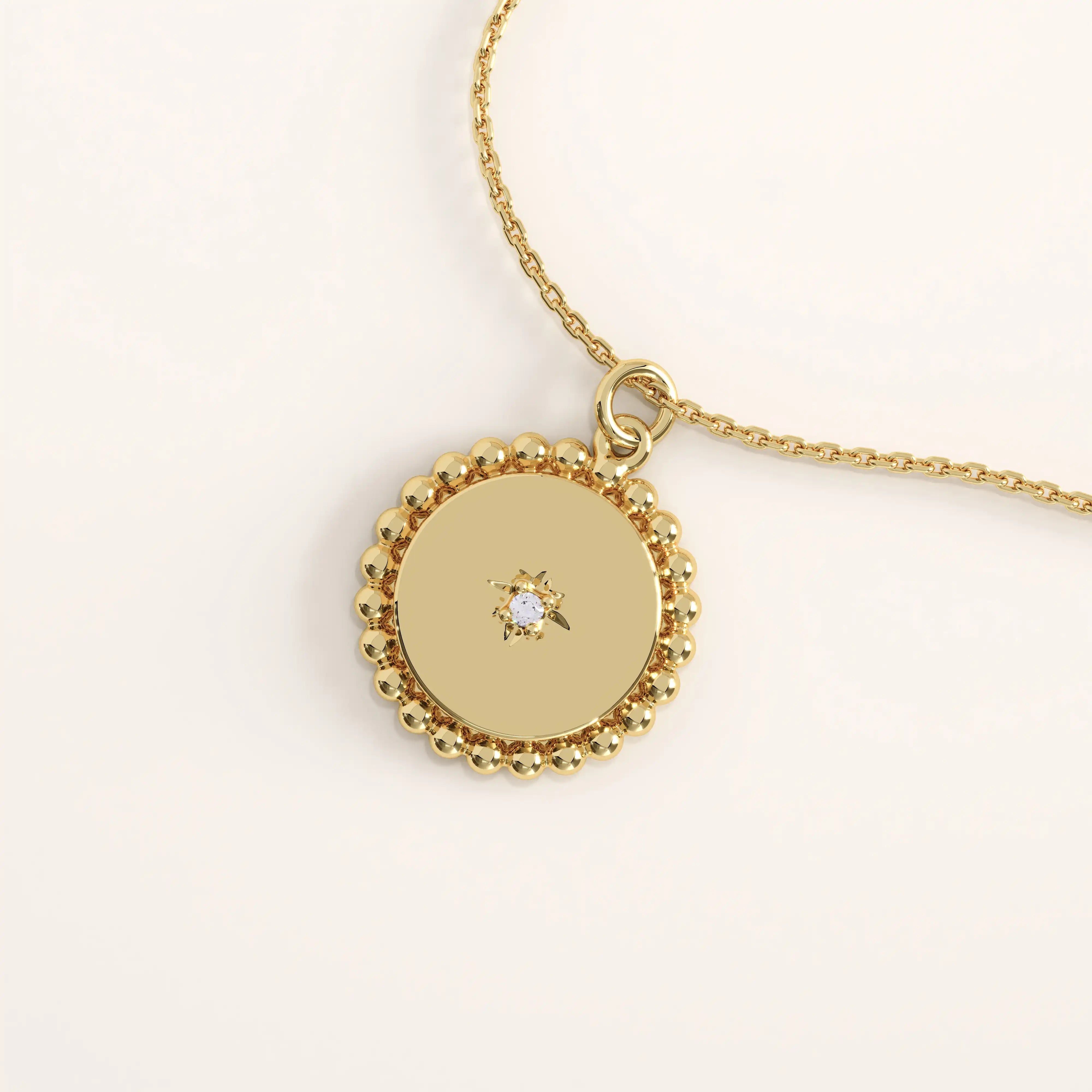 14k gold vermeil beaded coin necklace featuring a round polished pendant framed with delicate beaded detailing and a central star-set cubic zirconia for subtle brilliance.

