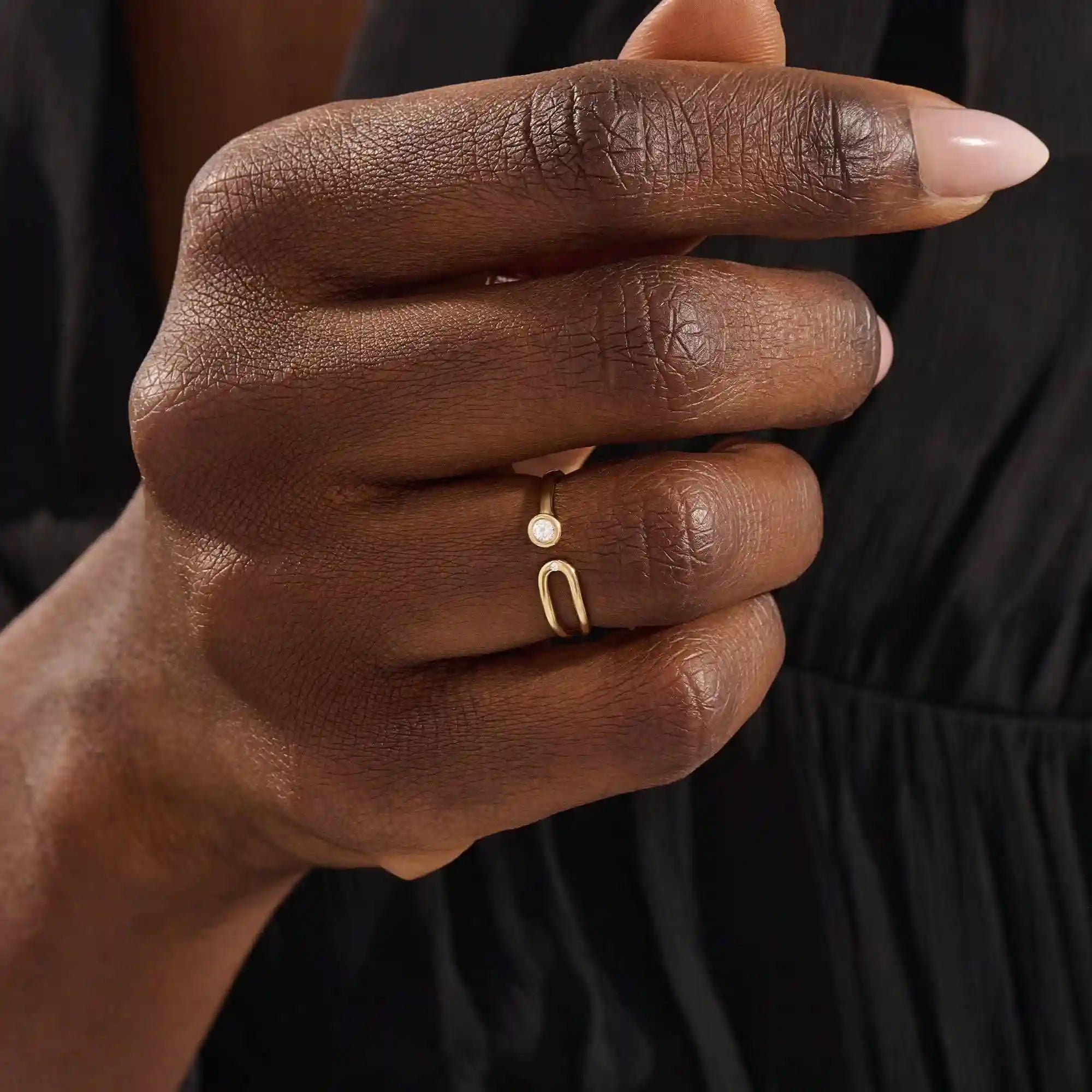 stackable statement ring features a bezel-set solitaire round stone in a 14K solid yellow gold band FOR WOMEN