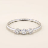 three bezel-set sparkling stones in brilliant 14k solid yellow gold slim band wedding stacking ring for women